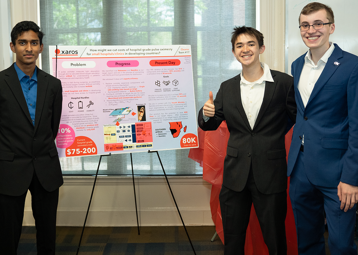 The O2xaros team during their poster presentation.